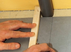 Carrelage : comment intégrer une canalisation