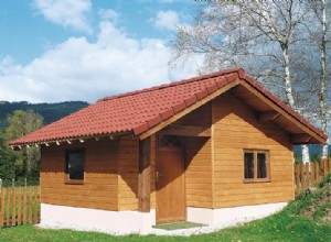 Réaliser un chalet à ossature et habillage bois sur assise maçonnée